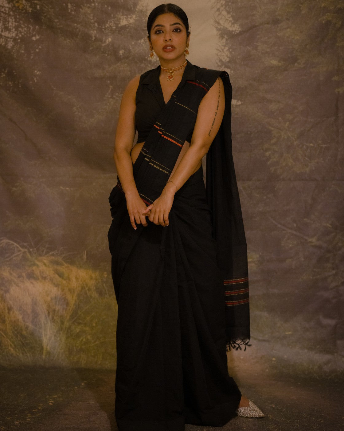 Karthika black and gold muthukara saree