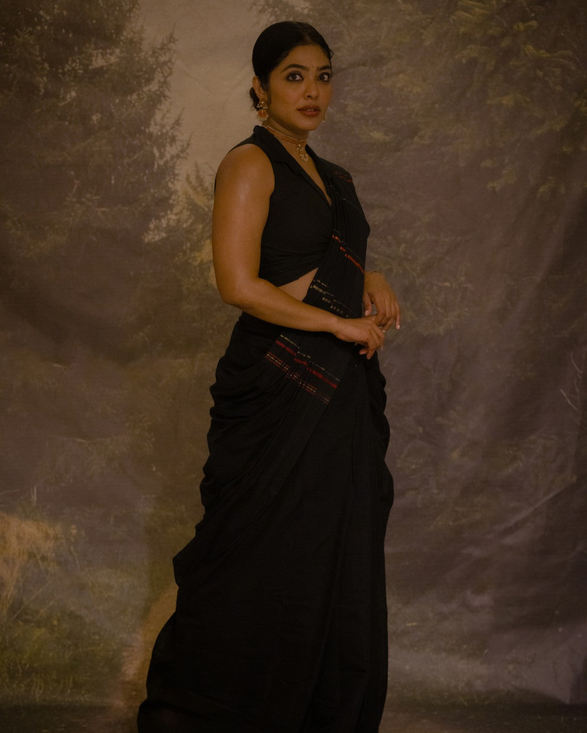 Karthika black and gold muthukara saree