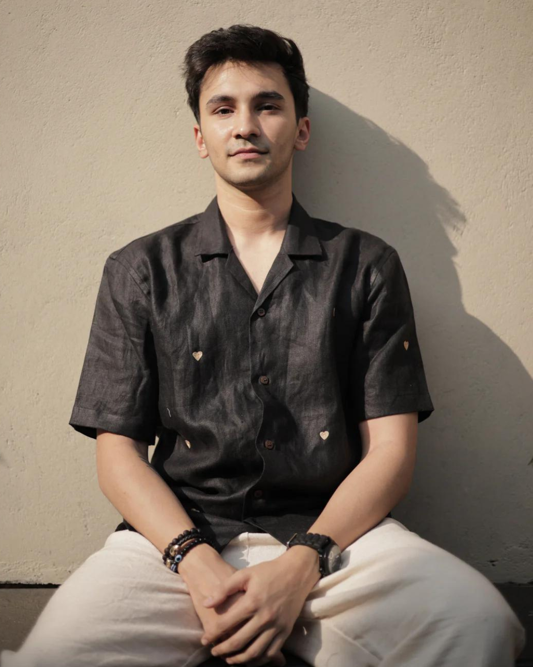 Hearts in black shirt