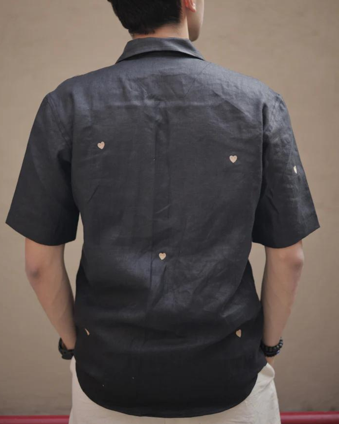 Hearts in black shirt
