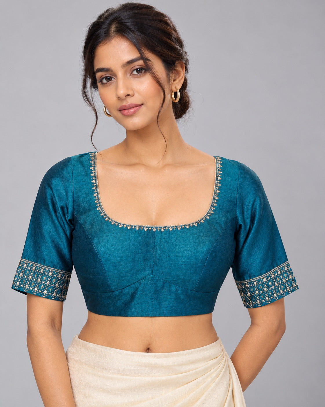 Neera Teal Embroidered Blouse