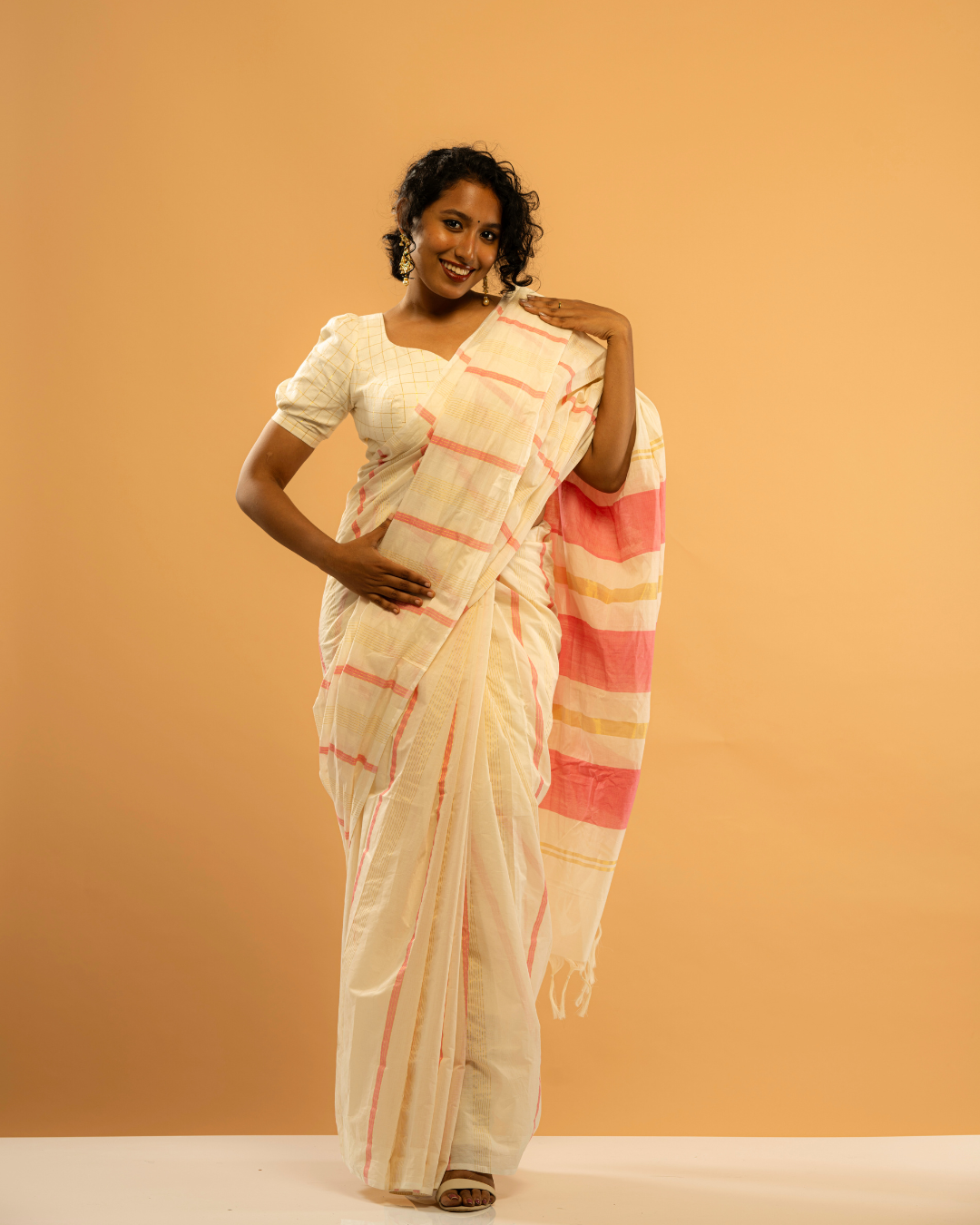 Madhurima | Pink-Golden Stripe Kasavu Saree