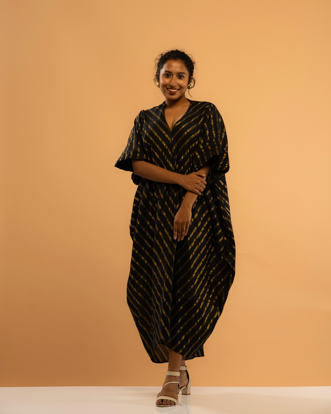 Nishagandhi | Gold Striped Black Kasavu Kaftan