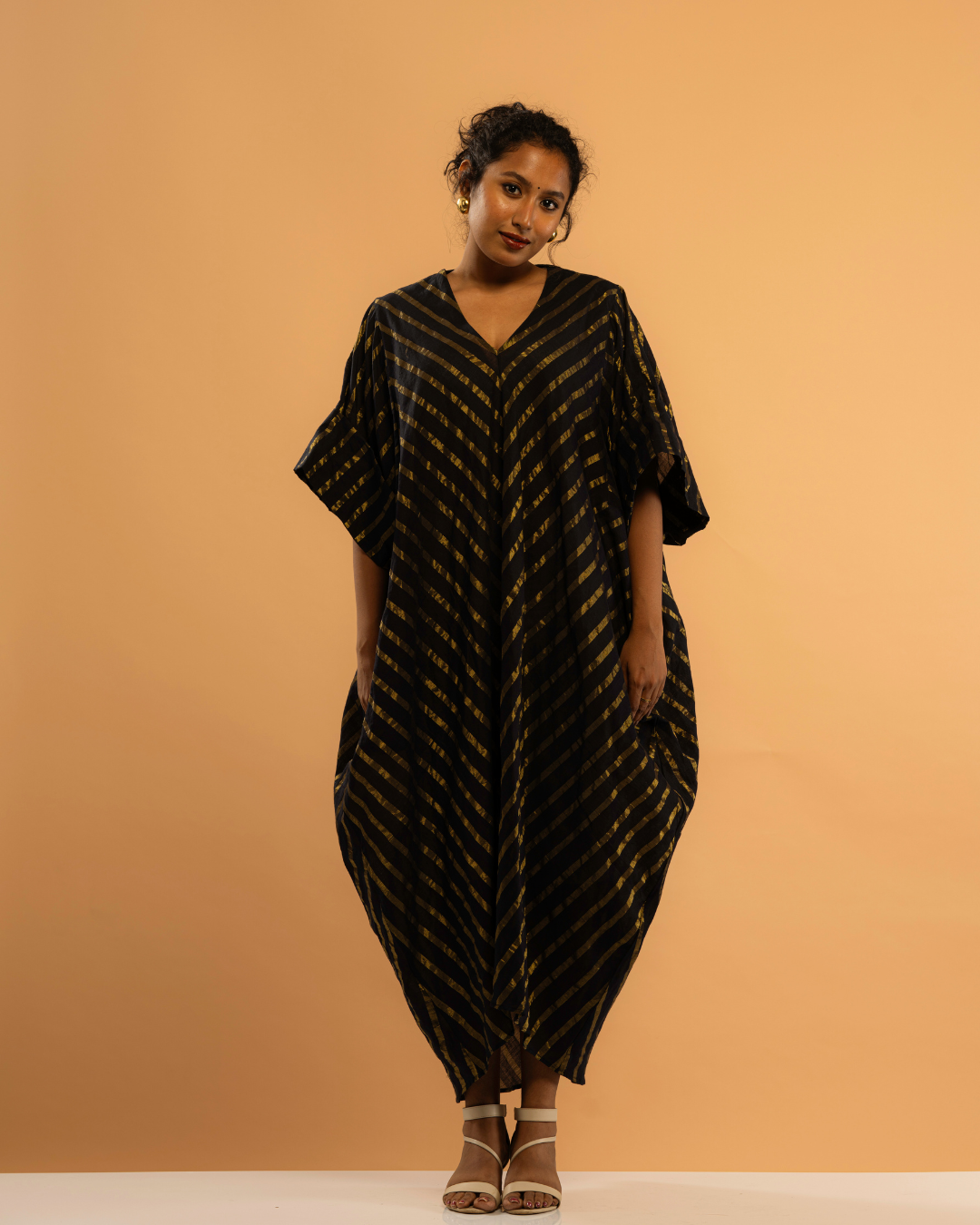 Nishagandhi | Gold Striped Black Kasavu Kaftan