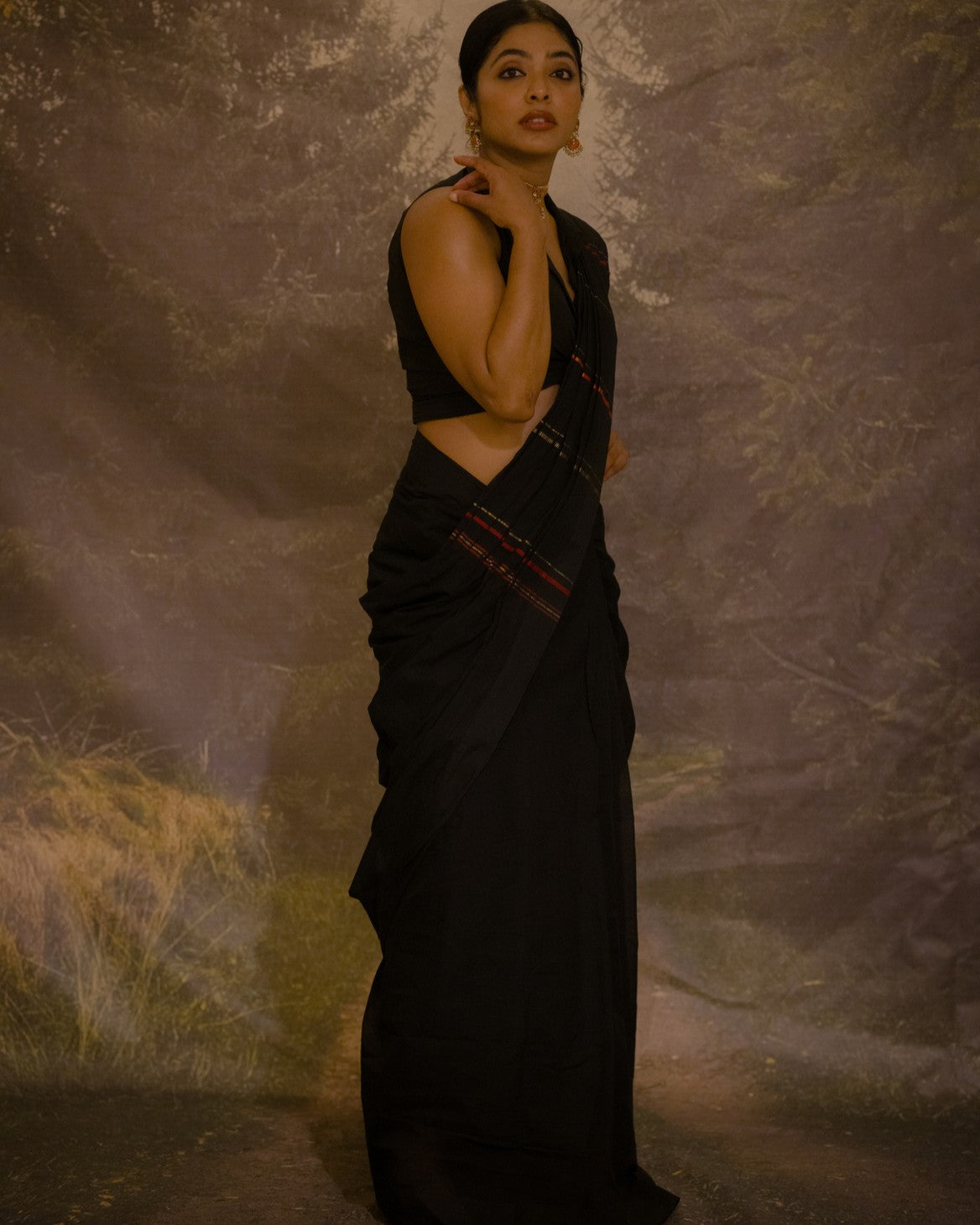 Karthika black and gold muthukara saree
