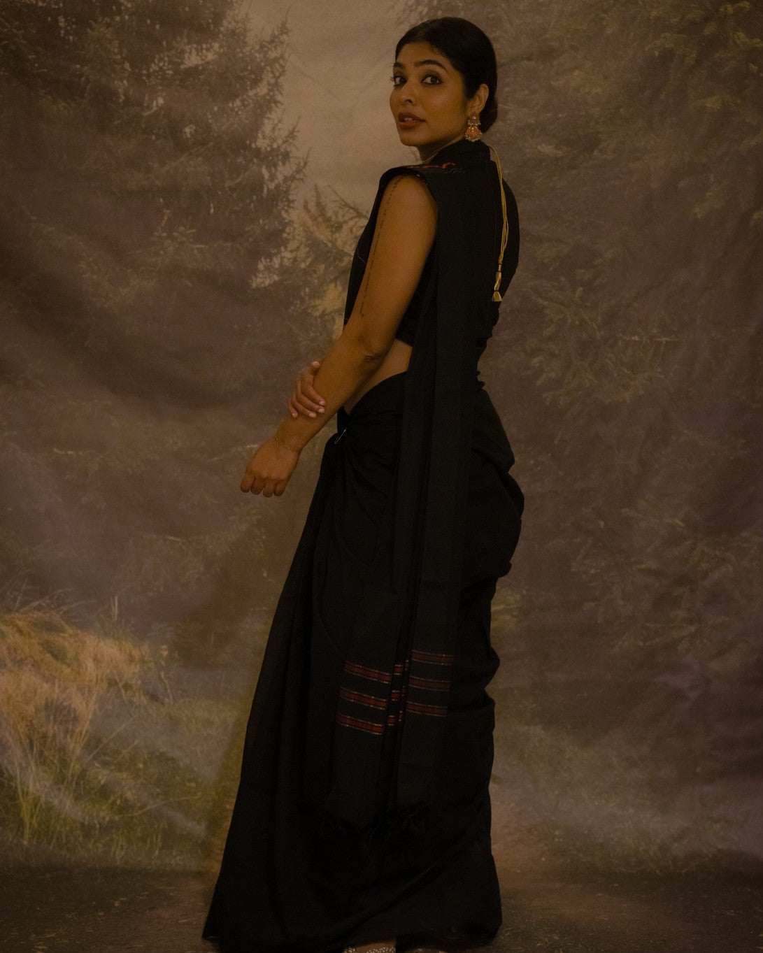 Karthika black and gold muthukara saree